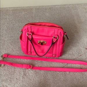 Pink handbag with removable straps